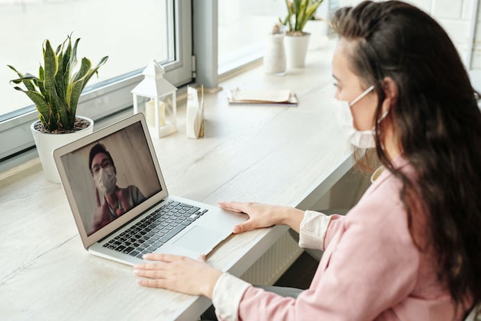 girl video calling on computer