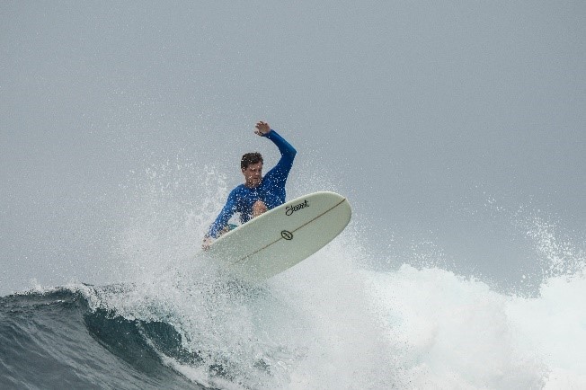 chris surfing